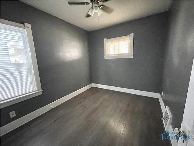 1741 Berkshire Pl, Toledo, OH 43613 - empty room featuring ceiling fan, dark wood-type flooring, and baseboards