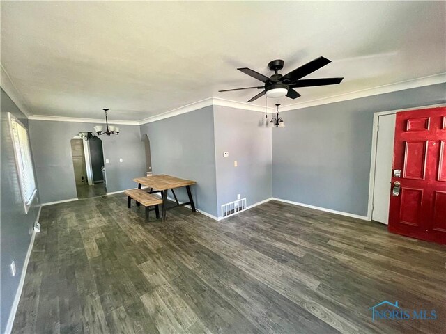 1949 Marlow Rd, Toledo, OH 43613 - unfurnished living room with arched walkways, a chandelier, crown molding, ceiling fan, and wood finished floors