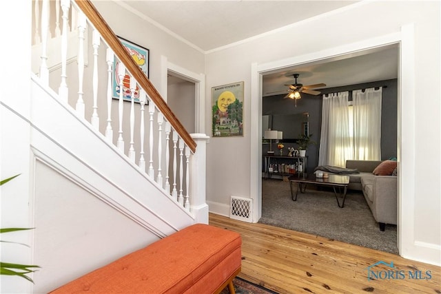 1407 Kenyon Dr, Toledo, OH 43614 - stairway with hardwood / wood-style flooring, ornamental molding, baseboards, and a ceiling fan