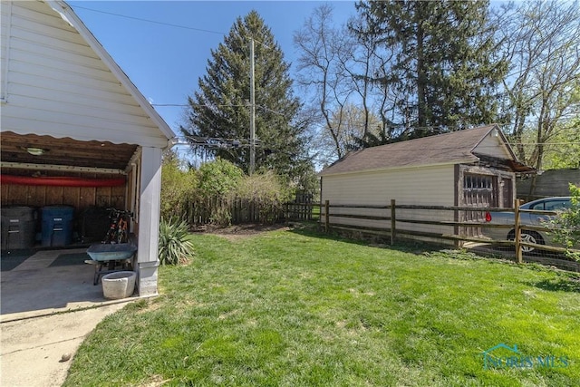 1407 Kenyon Dr, Toledo, OH 43614 - view of yard featuring an outbuilding