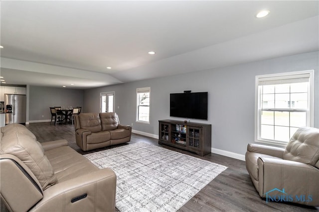 749 Parkside Dr, Wauseon, OH 43567 - living area featuring baseboards, recessed lighting, and dark wood-style flooring