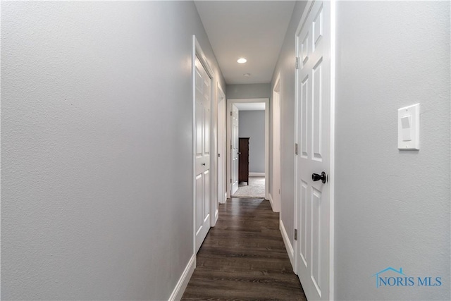 749 Parkside Dr, Wauseon, OH 43567 - corridor featuring recessed lighting, baseboards, and dark wood finished floors