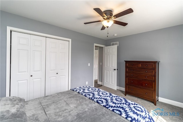 749 Parkside Dr, Wauseon, OH 43567 - carpeted bedroom featuring visible vents, baseboards, ceiling fan, and a closet