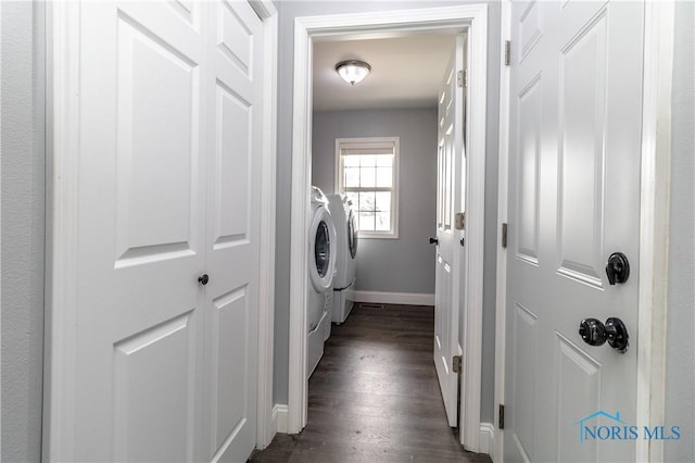 749 Parkside Dr, Wauseon, OH 43567 - laundry area with laundry area, dark wood-style flooring, baseboards, and washer and dryer