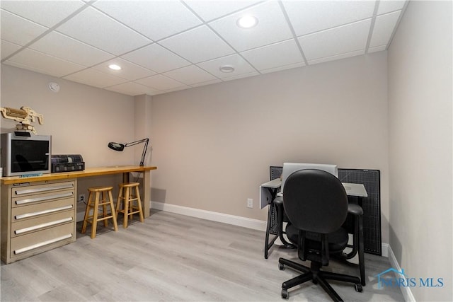 749 Parkside Dr, Wauseon, OH 43567 - home office with recessed lighting, baseboards, a drop ceiling, and wood finished floors