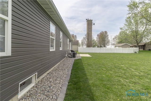 749 Parkside Dr, Wauseon, OH 43567 - view of yard with central AC unit and fence