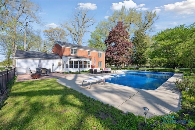 106 N Munson Rd, Swanton, OH 43558 - view of pool featuring a patio area, outdoor lounge area, a diving board, and a sunroom