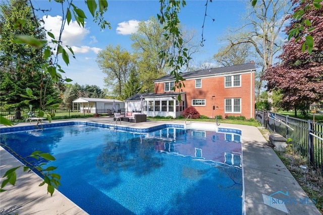 106 N Munson Rd, Swanton, OH 43558 - view of pool with a fenced backyard, a sunroom, a patio area, and a diving board
