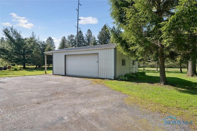 106 N Munson Rd, Swanton, OH 43558 - detached garage with asphalt driveway