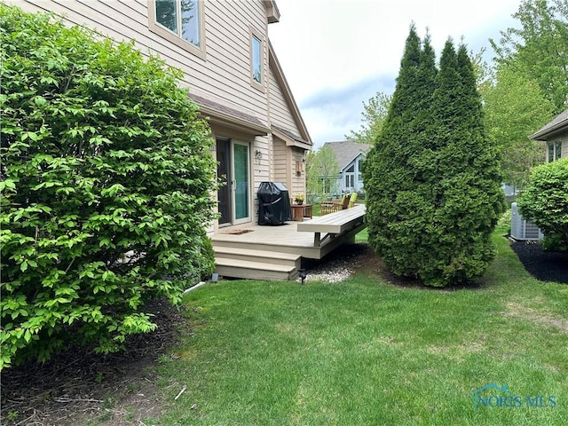 view of yard featuring a deck