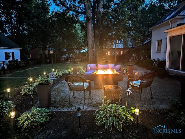 3766 Edgevale Rd, Toledo, OH 43606 - view of yard with an outdoor fire pit, a patio, and fence