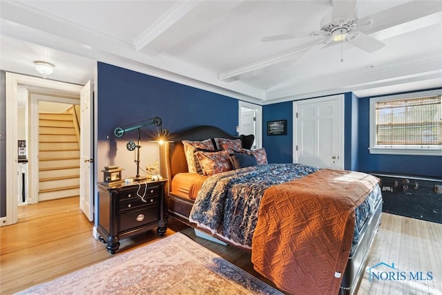 3766 Edgevale Rd, Toledo, OH 43606 - bedroom featuring wood finished floors, beamed ceiling, and ceiling fan
