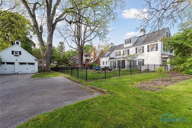 3766 Edgevale Rd, Toledo, OH 43606 - view of yard with a garage and a residential view