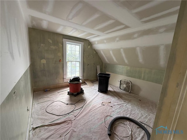 bonus room with vaulted ceiling