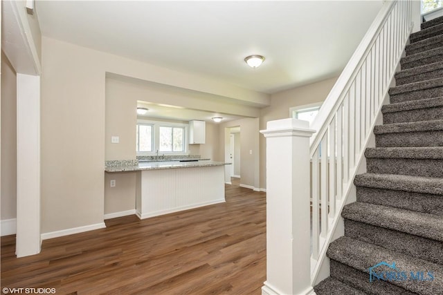 303 Short St, Napoleon, OH 43545 - staircase with baseboards and wood finished floors