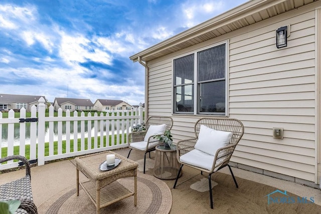 26328 Stillwater Dr, Perrysburg, OH 43551 - view of patio / terrace with a residential view and a water view