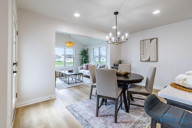 26328 Stillwater Dr, Perrysburg, OH 43551 - dining room with a chandelier, light wood-type flooring, baseboards, recessed lighting, and lofted ceiling