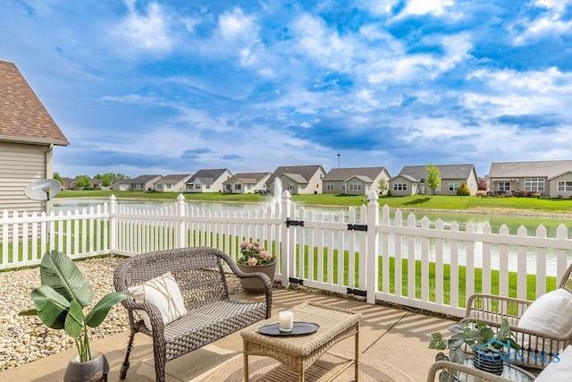 26328 Stillwater Dr, Perrysburg, OH 43551 - view of patio / terrace with a residential view and a water view