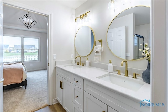26328 Stillwater Dr, Perrysburg, OH 43551 - full bath with double vanity, ensuite bath, baseboards, and a shower with door