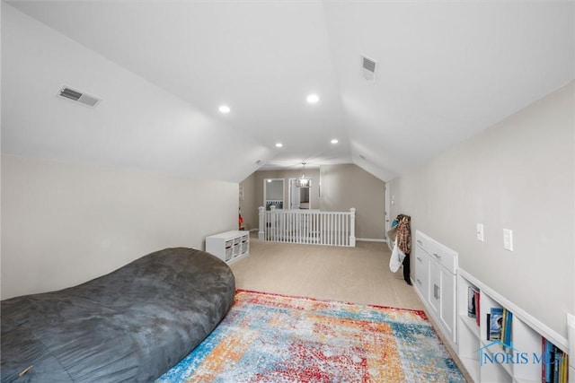 sitting room with visible vents, recessed lighting, vaulted ceiling, and light colored carpet