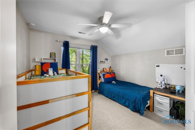 bedroom with carpet floors, visible vents, ceiling fan, and lofted ceiling