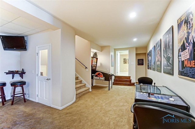 interior space featuring carpet floors, baseboards, and recessed lighting