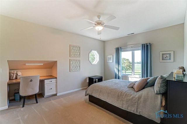 bedroom with a ceiling fan, baseboards, visible vents, and light carpet