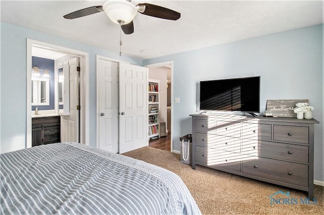 29058 White Rd, Perrysburg, OH 43551 - carpeted bedroom with ceiling fan, baseboards, and ensuite bath