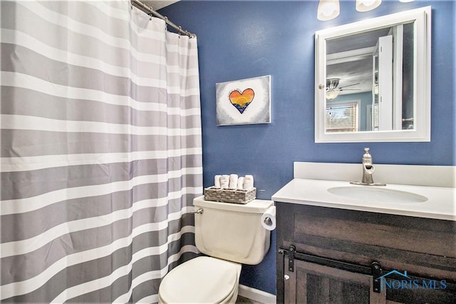 29058 White Rd, Perrysburg, OH 43551 - bathroom with toilet, baseboards, and vanity