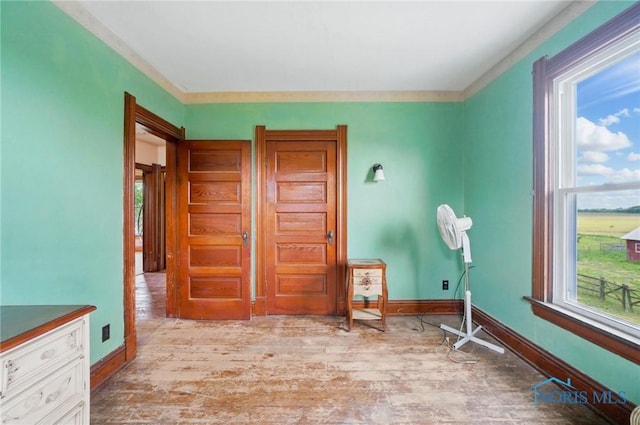 13707 Brint Rd, Berkey, OH 43504 - interior space featuring wood finished floors, baseboards, and vanity