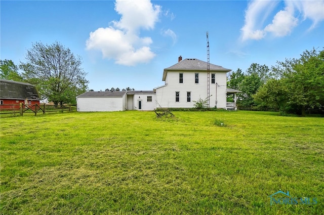 13707 Brint Rd, Berkey, OH 43504 - rear view of house featuring a chimney