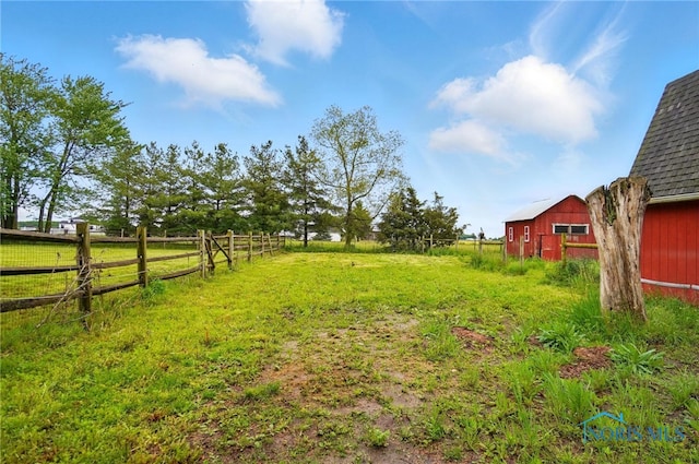13707 Brint Rd, Berkey, OH 43504 - view of yard with a barn, an outbuilding, and a view of countryside