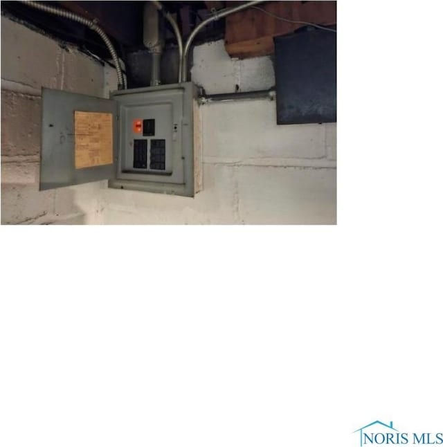 utility room featuring electric panel