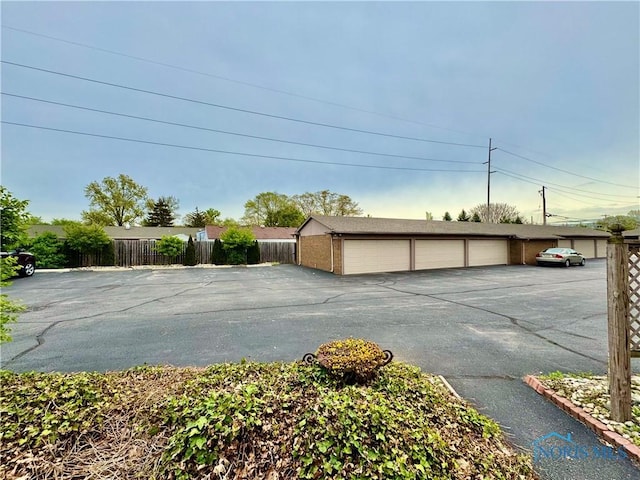 garage with fence