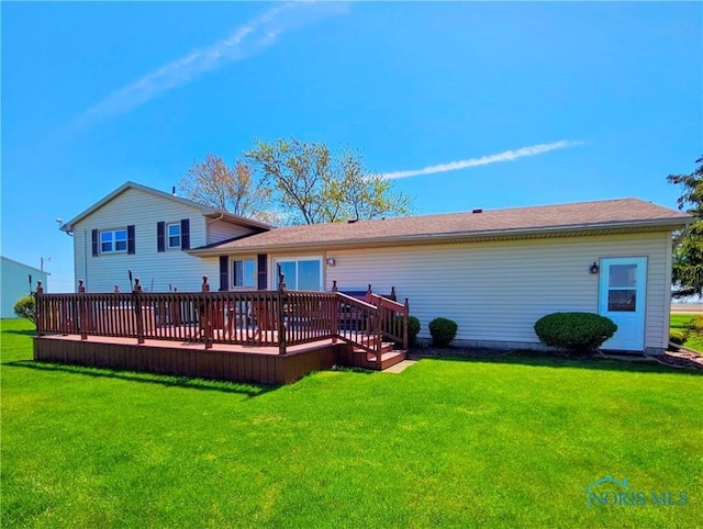 24046 Defiance Pike, Custar, OH 43511 - back of property with a wooden deck and a yard