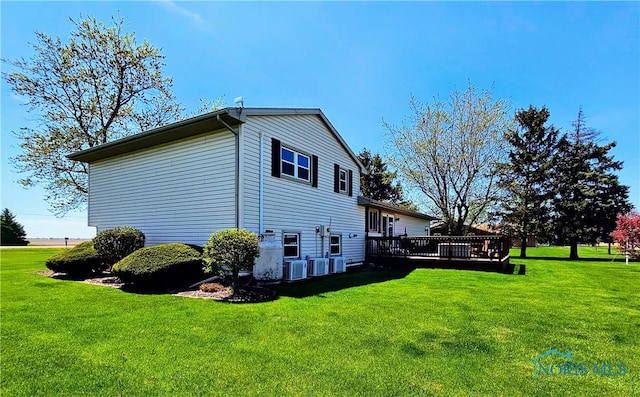 24046 Defiance Pike, Custar, OH 43511 - view of property exterior with a wooden deck, a yard, and cooling unit