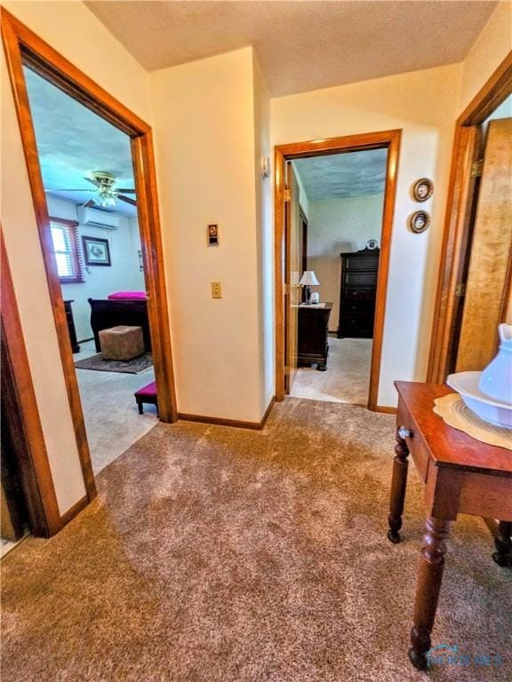 24046 Defiance Pike, Custar, OH 43511 - hall with carpet floors, a wall mounted air conditioner, and baseboards