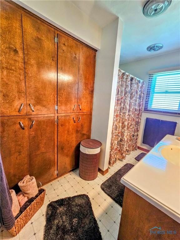 24046 Defiance Pike, Custar, OH 43511 - bathroom featuring tile patterned floors and a shower with shower curtain