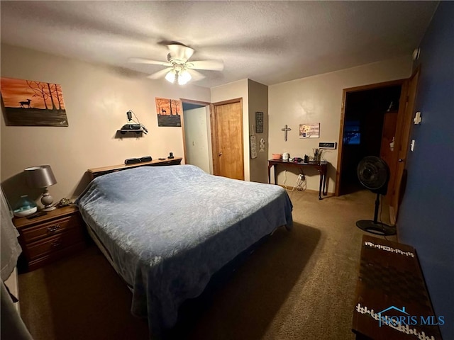 bedroom featuring ceiling fan and carpet flooring