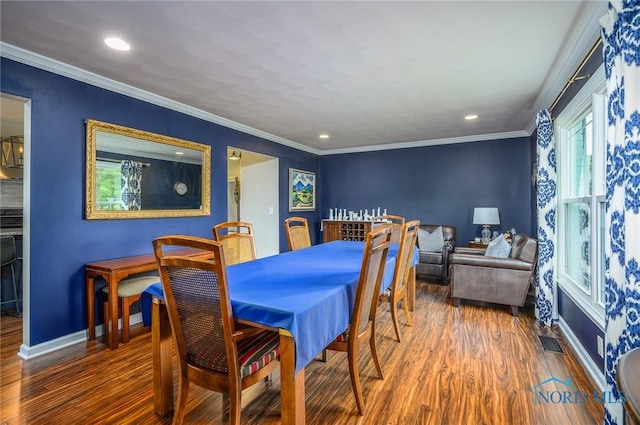 dining room with visible vents, recessed lighting, baseboards, and wood finished floors