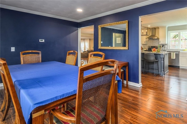 dining space with recessed lighting, baseboards, ornamental molding, and dark wood-style floors