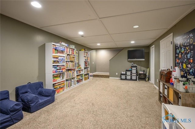 living area with carpet flooring, recessed lighting, and baseboards