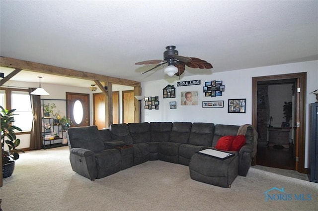 living area with ceiling fan and light colored carpet