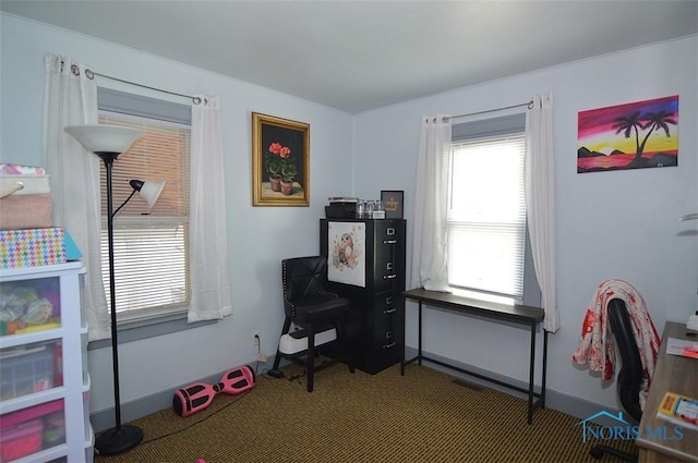 playroom featuring baseboards and carpet