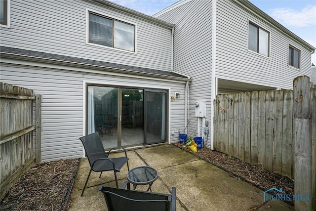 back of house featuring fence and a patio