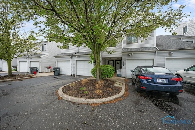 view of front of house featuring a garage and driveway
