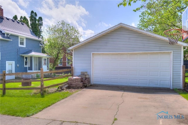 229 E Harrison St, Maumee, OH 43537 - detached garage featuring fence