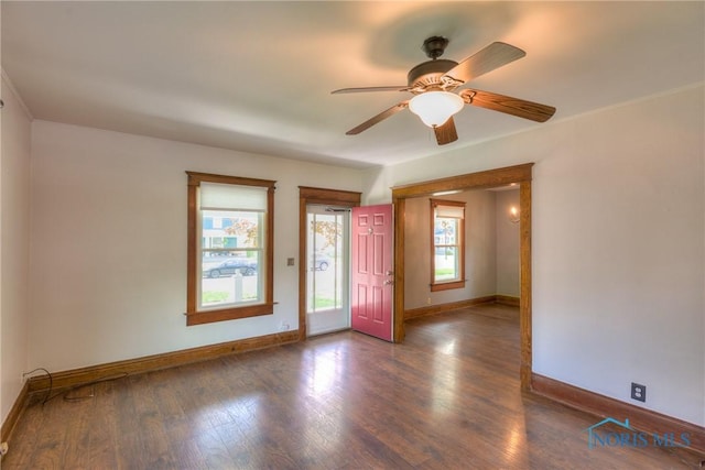 229 E Harrison St, Maumee, OH 43537 - unfurnished room with ornamental molding, baseboards, and wood finished floors
