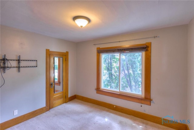229 E Harrison St, Maumee, OH 43537 - spare room with baseboards and carpet flooring