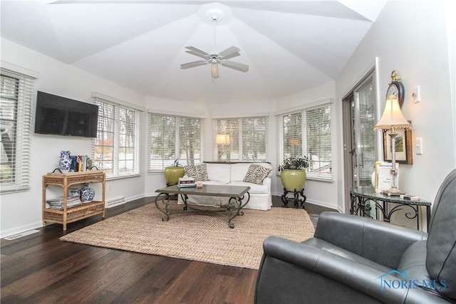 interior space featuring plenty of natural light, wood finished floors, lofted ceiling, and ceiling fan